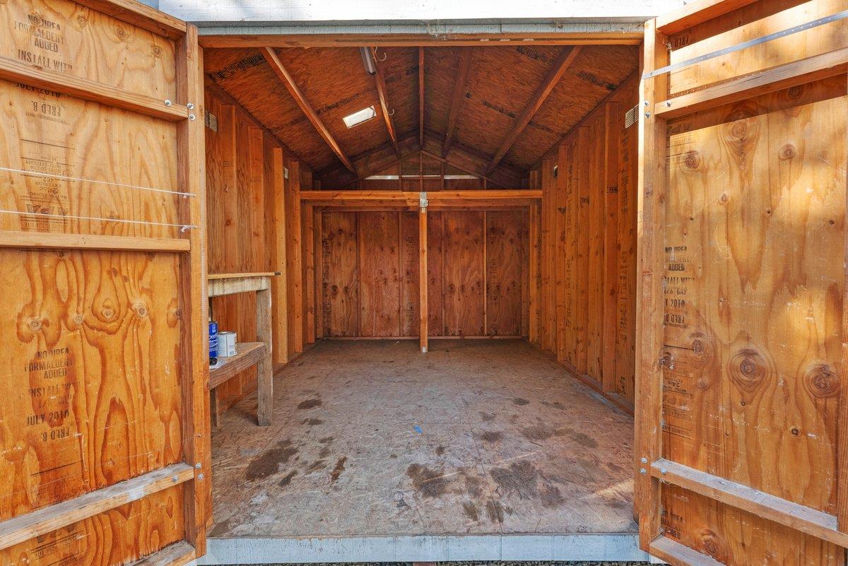 225 Owl Ridge Way Aptos, CA 95003 - Photo 25 of 26 a view of an empty room with wooden floor and a window