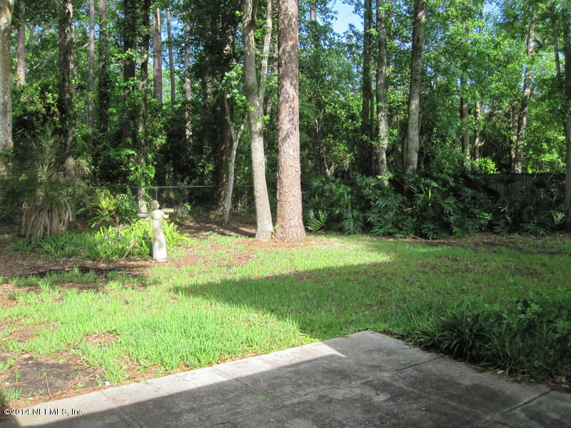11440 Scott Mill Road Jacksonville, FL 32223 - Photo 23 of 26 a view of backyard with green space
