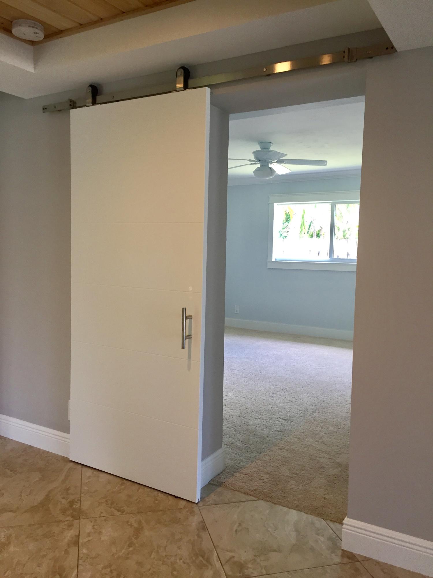 301 Southwest 7th Avenue Boca Raton, FL 33486 - Photo 26 of 46 Barn door entrance to master suite