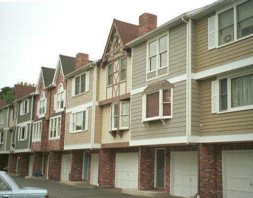 170 Wade Street, Unit 4 Bridgeport, CT 06604 - Photo 1 of 1 a front view of a building