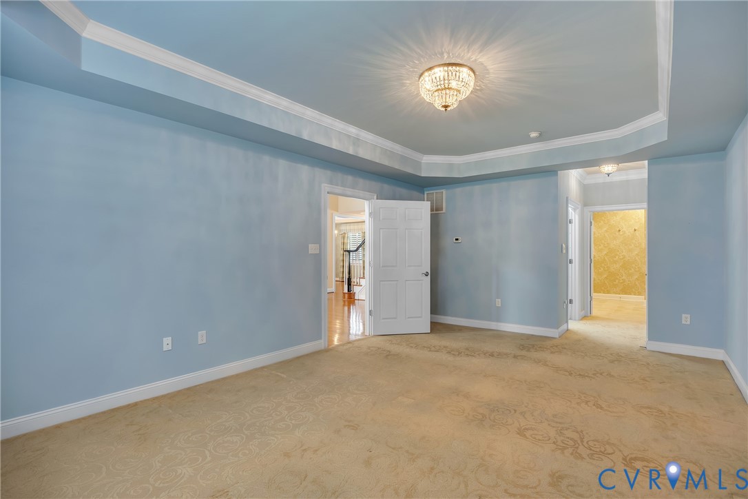 10011 Berry Pond Lane Mechanicsville, VA 23116 - Photo 17 of 47 a view of an empty room with a window