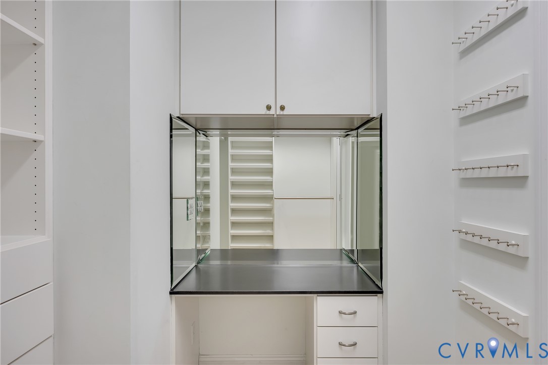 10011 Berry Pond Lane Mechanicsville, VA 23116 - Photo 20 of 47 a kitchen with a refrigerator and white cabinets