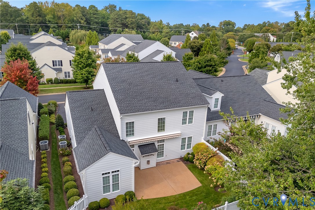 10011 Berry Pond Lane Mechanicsville, VA 23116 - Photo 40 of 47 an aerial view of multiple houses with a yard