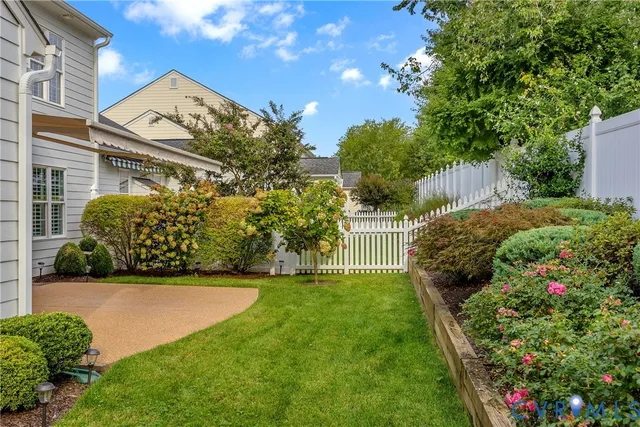 a view of backyard with a outdoor space