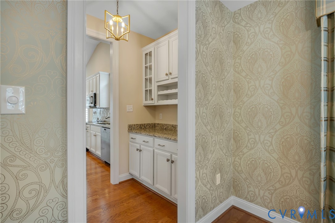 10011 Berry Pond Lane Mechanicsville, VA 23116 - Photo 7 of 47 a bathroom with a sink and a mirror