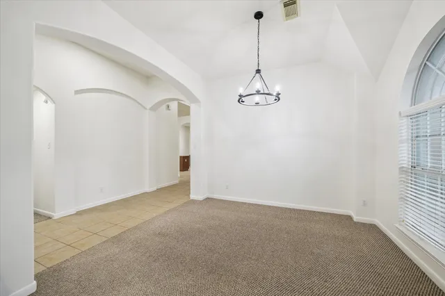 a view of a room with windows