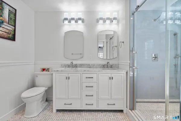a view of a house with a large window and wooden floor