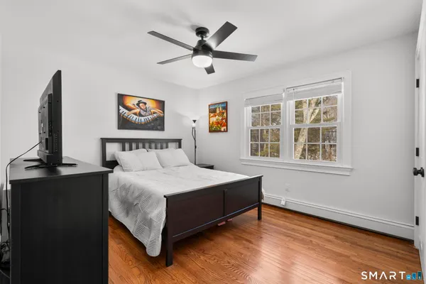 a front view of a house with a covered with snow in front of house