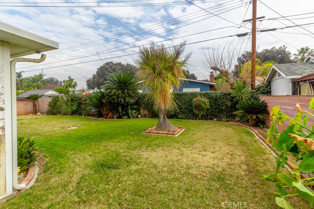 4151 Manchester Place Riverside, CA 92503 - Photo 32 of 36 a front view of a house with garden
