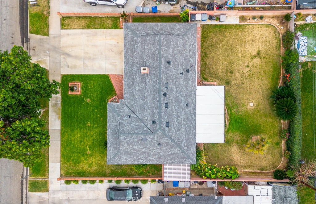 4151 Manchester Place Riverside, CA 92503 - Photo 34 of 36 a aerial view of a brick house with a yard