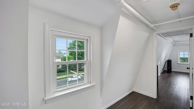 a view of livingroom with furniture and a window