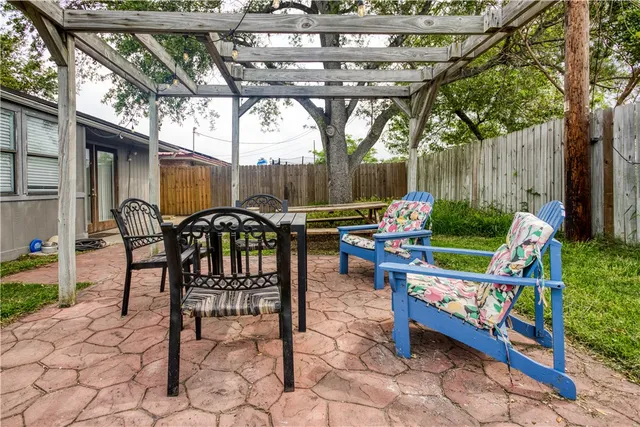 a chairs and table in a patio
