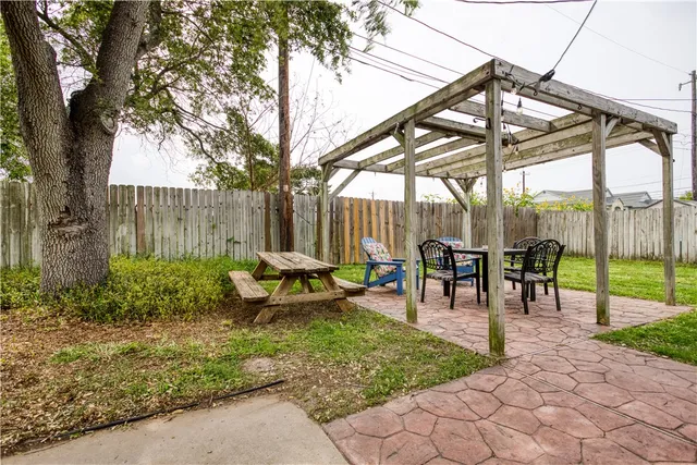 a view of outdoor space with seating area and garden