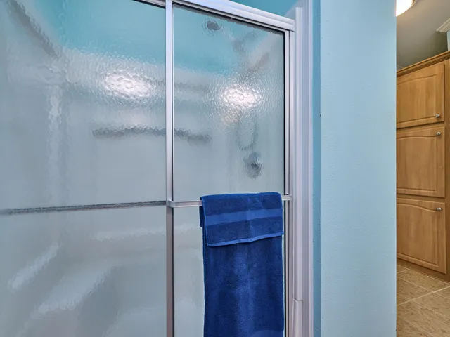 a view of a balcony with wooden floor