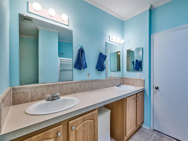 an aerial view of a house with a garden