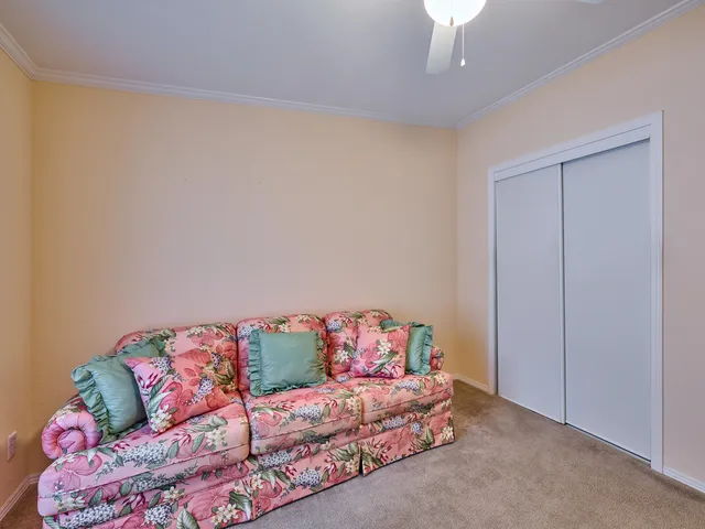 a view of a lake with houses in the back