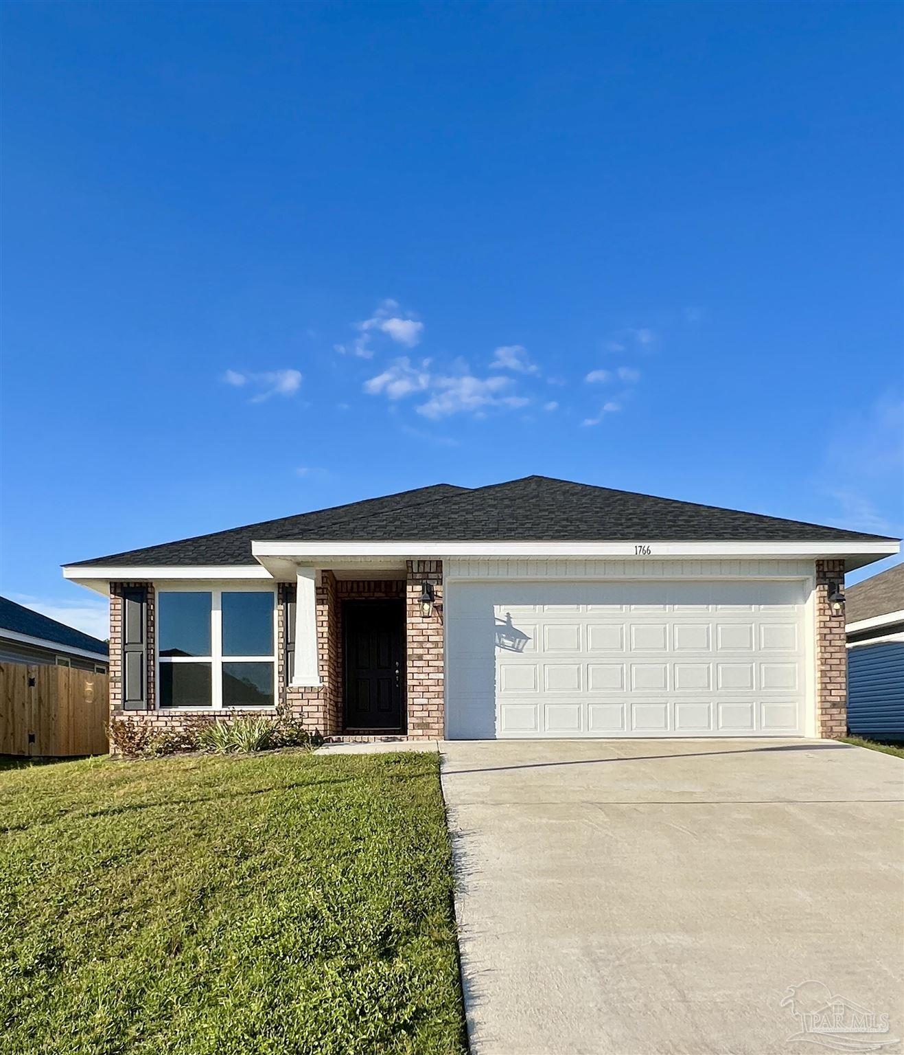 front view of house with a yard