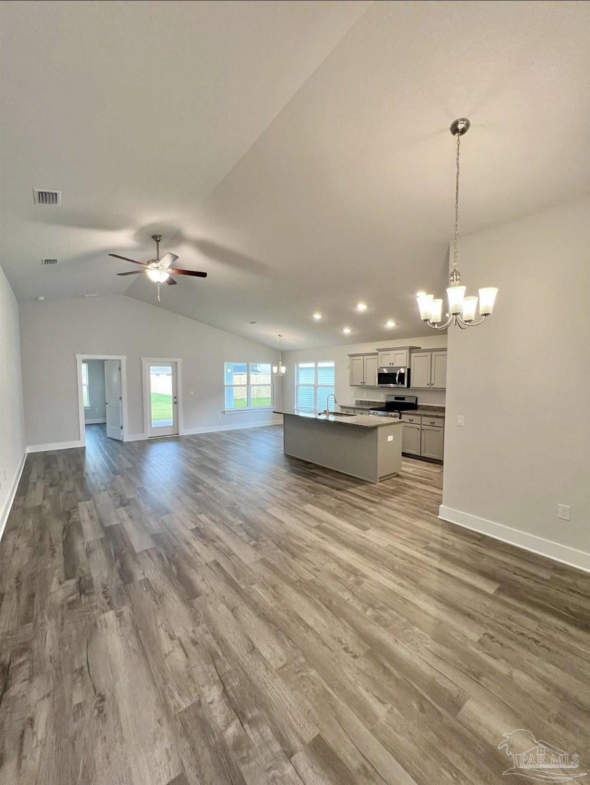 1766 Leigh Loop, Unit 3D Cantonment, FL 32533 - Photo 2 of 8 a view of an empty room and kitchen view