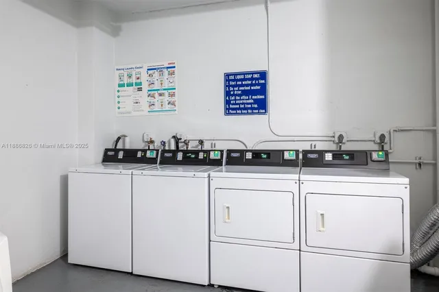 a kitchen with cabinets a window and a stainless steel appliances