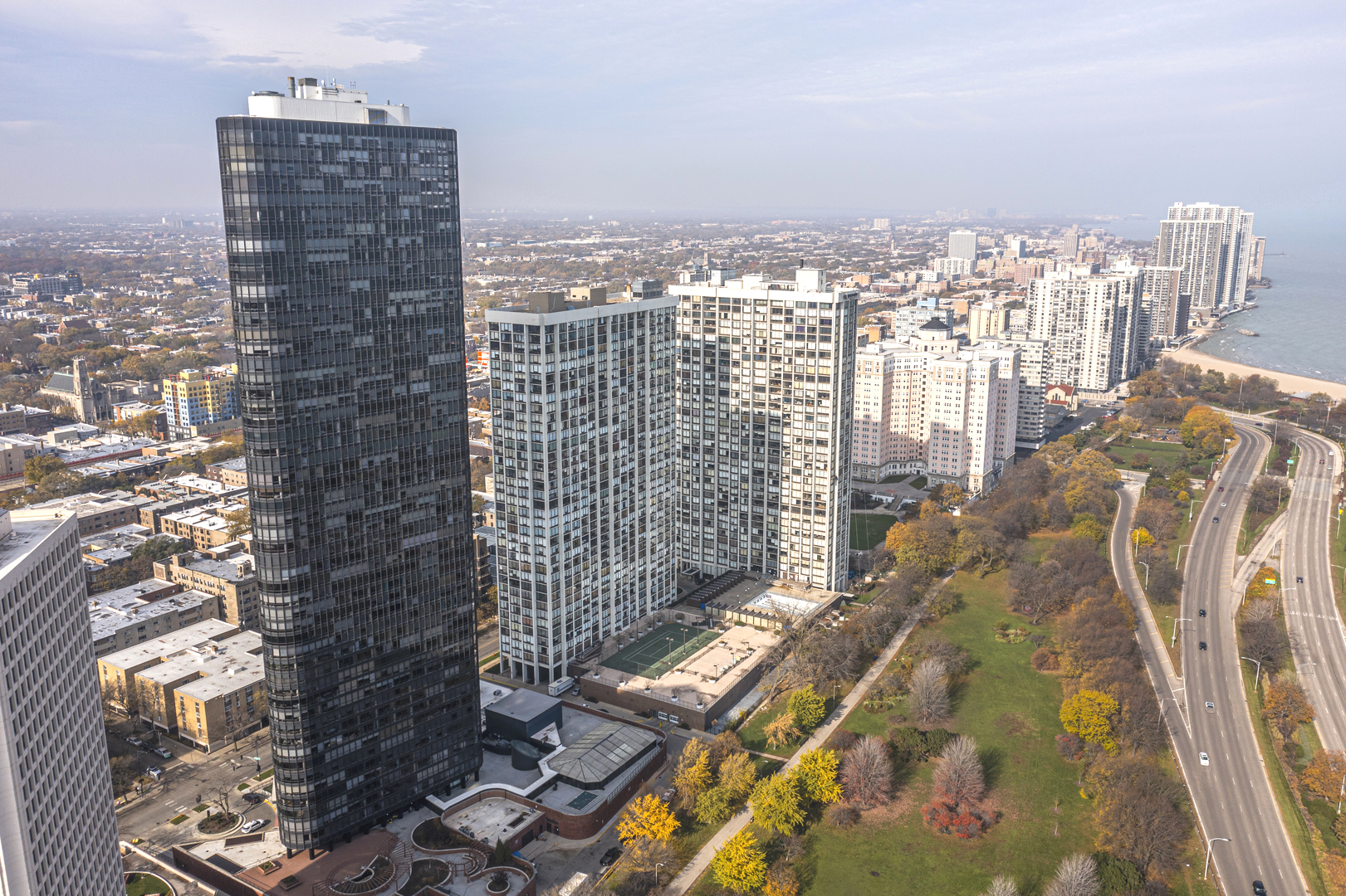 5415 North Sheridan Road, Unit 5409 Chicago, IL 60640 - Photo 2 of 37 a view of a city with tall buildings