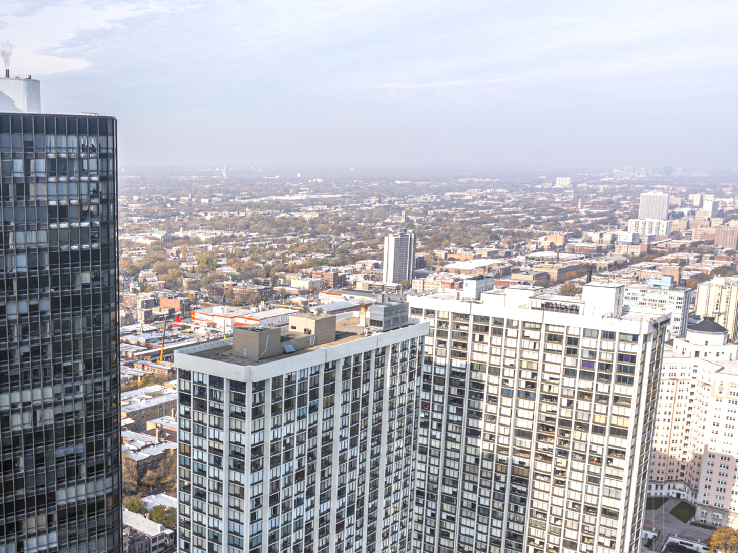 5415 North Sheridan Road, Unit 5409 Chicago, IL 60640 - Photo 25 of 37 a view of a city with tall buildings