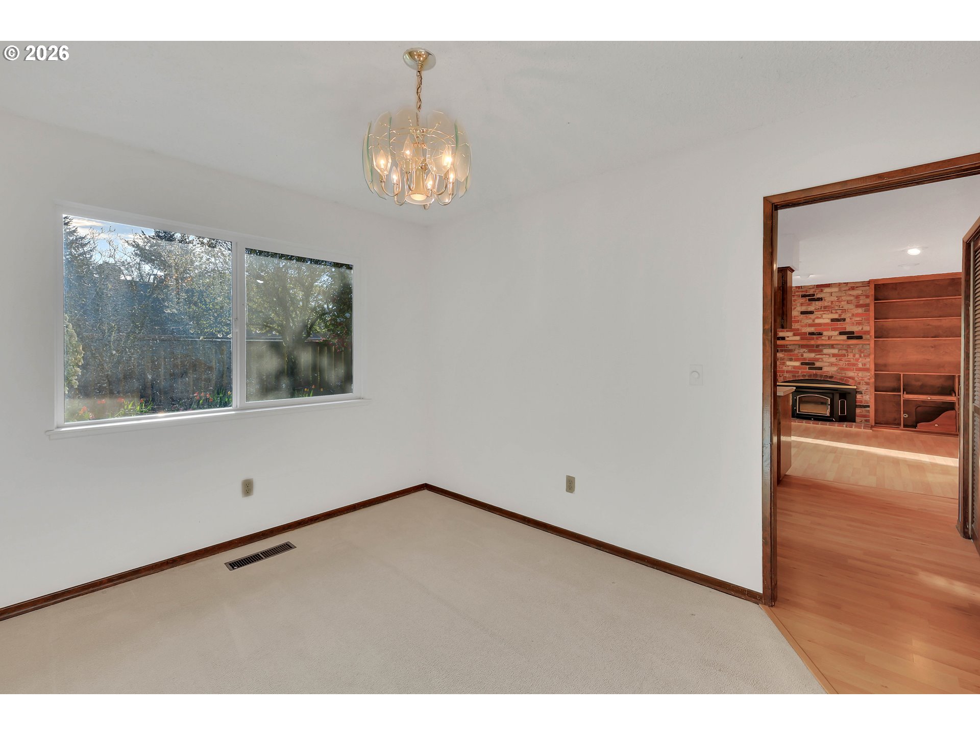 6980 Southwest 130th Avenue Beaverton, OR 97008 - Photo 14 of 38 a view of an empty room with a window