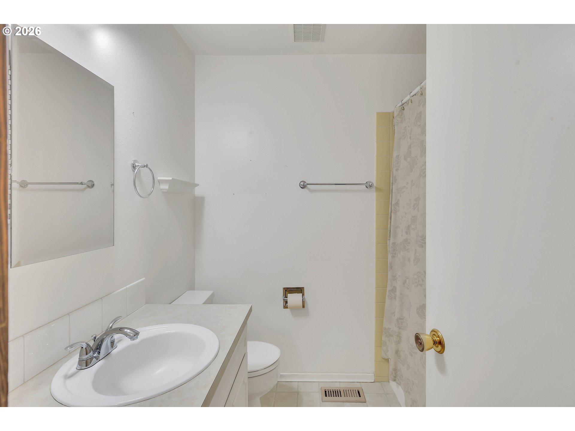 6980 Southwest 130th Avenue Beaverton, OR 97008 - Photo 30 of 38 a bathroom with a sink and a mirror