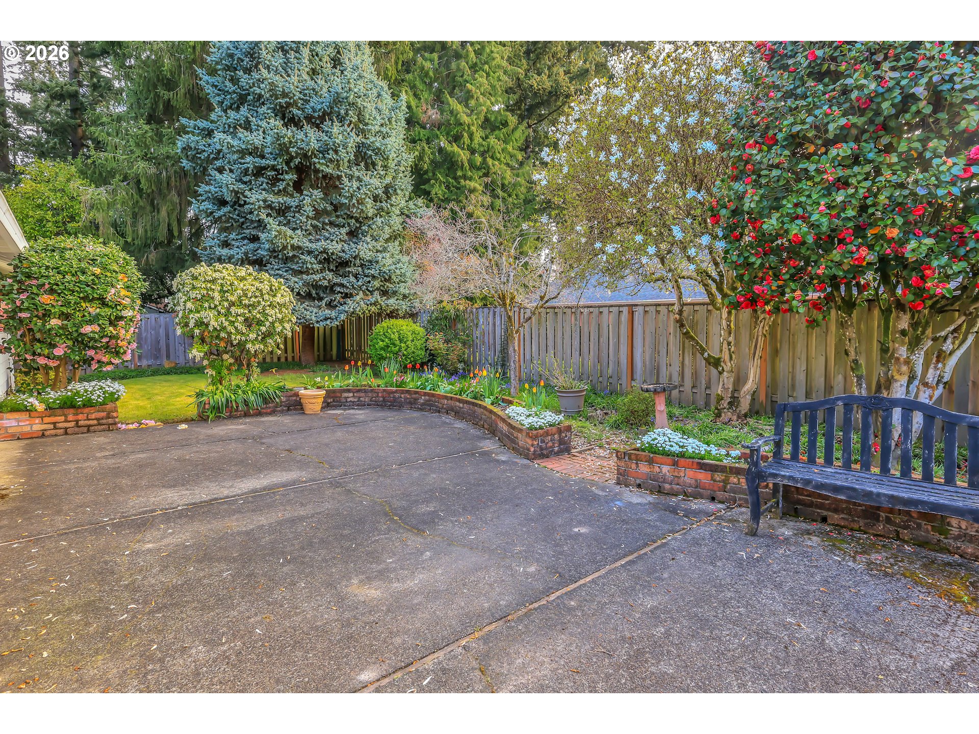 6980 Southwest 130th Avenue Beaverton, OR 97008 - Photo 35 of 38 a view of backyard with outdoor seating and green space
