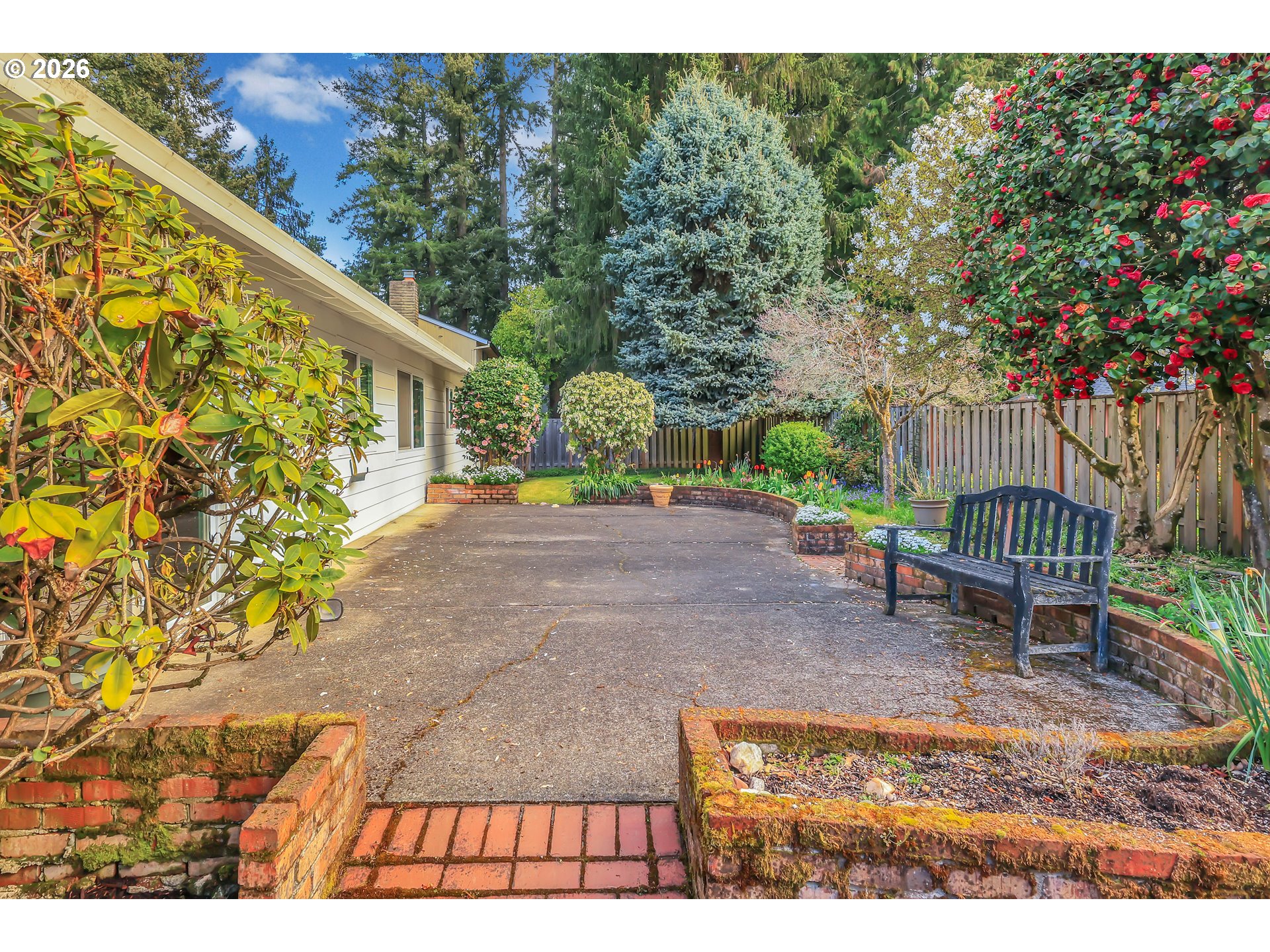 6980 Southwest 130th Avenue Beaverton, OR 97008 - Photo 36 of 38 a backyard of a house with outdoor seating