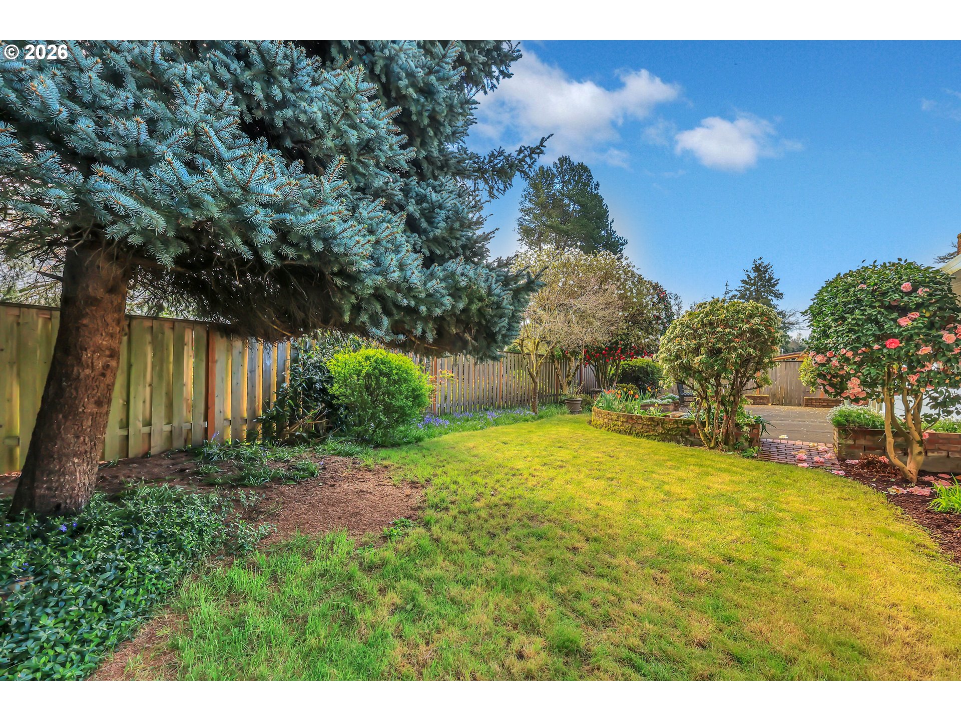 6980 Southwest 130th Avenue Beaverton, OR 97008 - Photo 37 of 38 a view of a backyard
