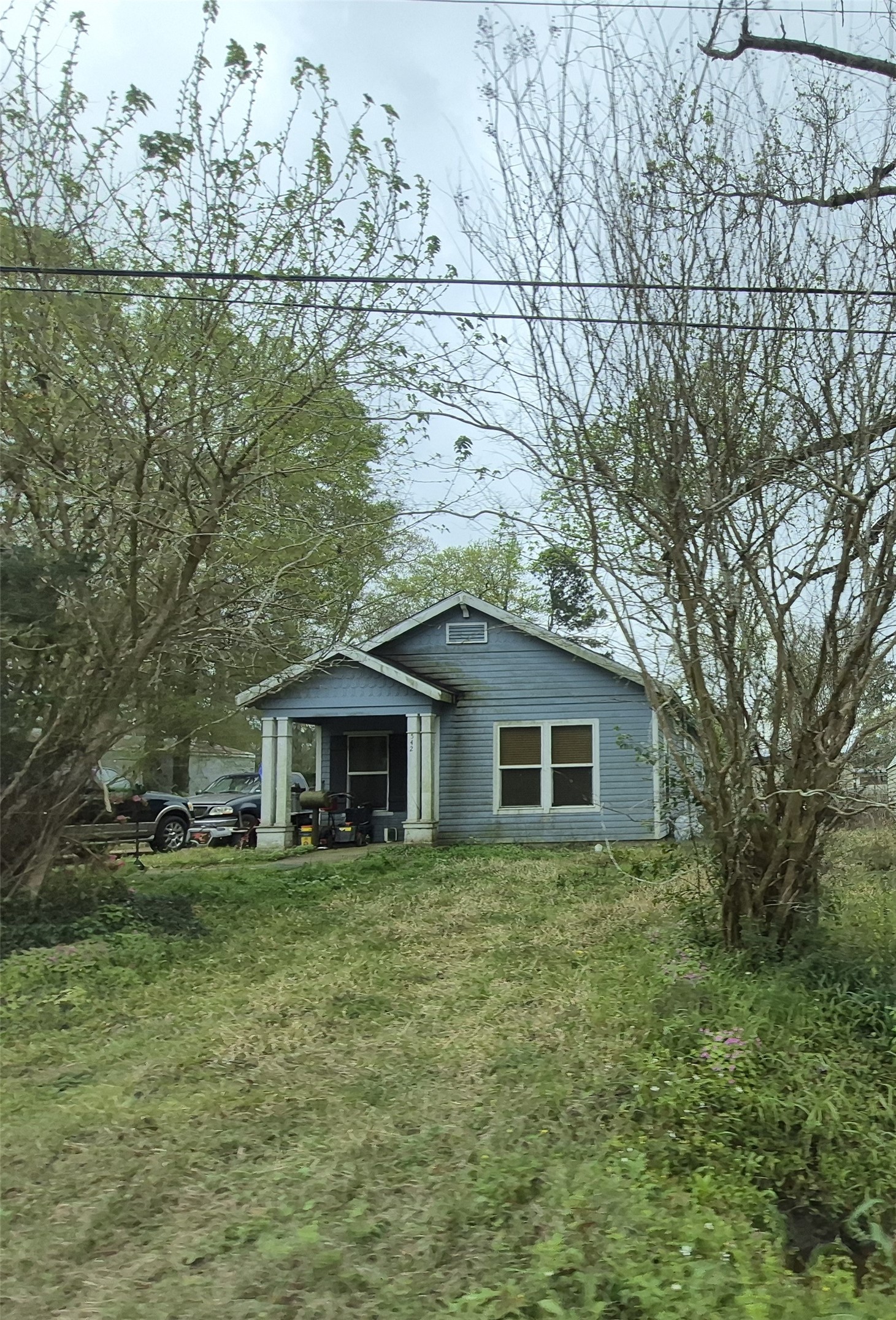 542 Horn Road Lumberton, TX 77657 - Photo 1 of 3 a view of a house with a yard