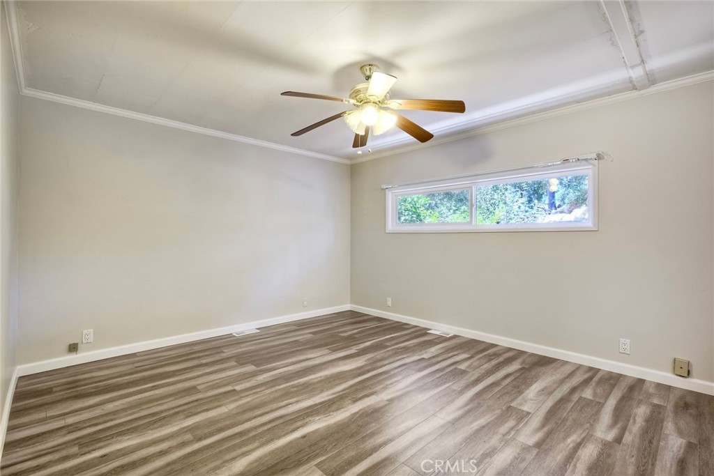 4747 Oak Crest Road, Unit 28 Fallbrook, CA 92028 - Photo 26 of 29 a view of room with window and ceiling fan