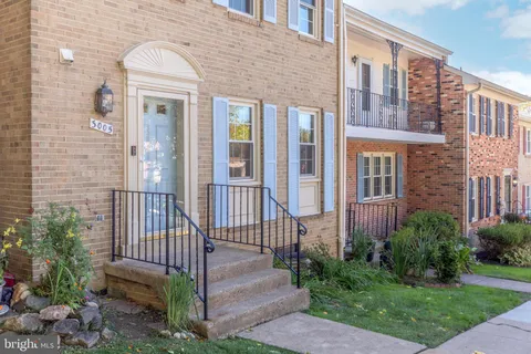 a front view of a house with a porch