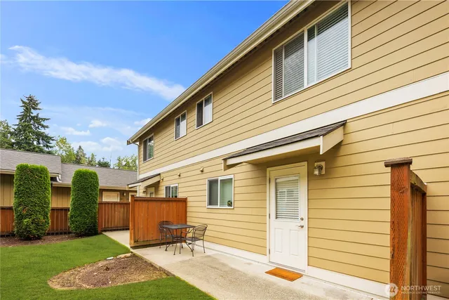 a view of a back yard of the house