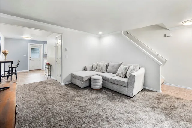 a living room with furniture and a couch