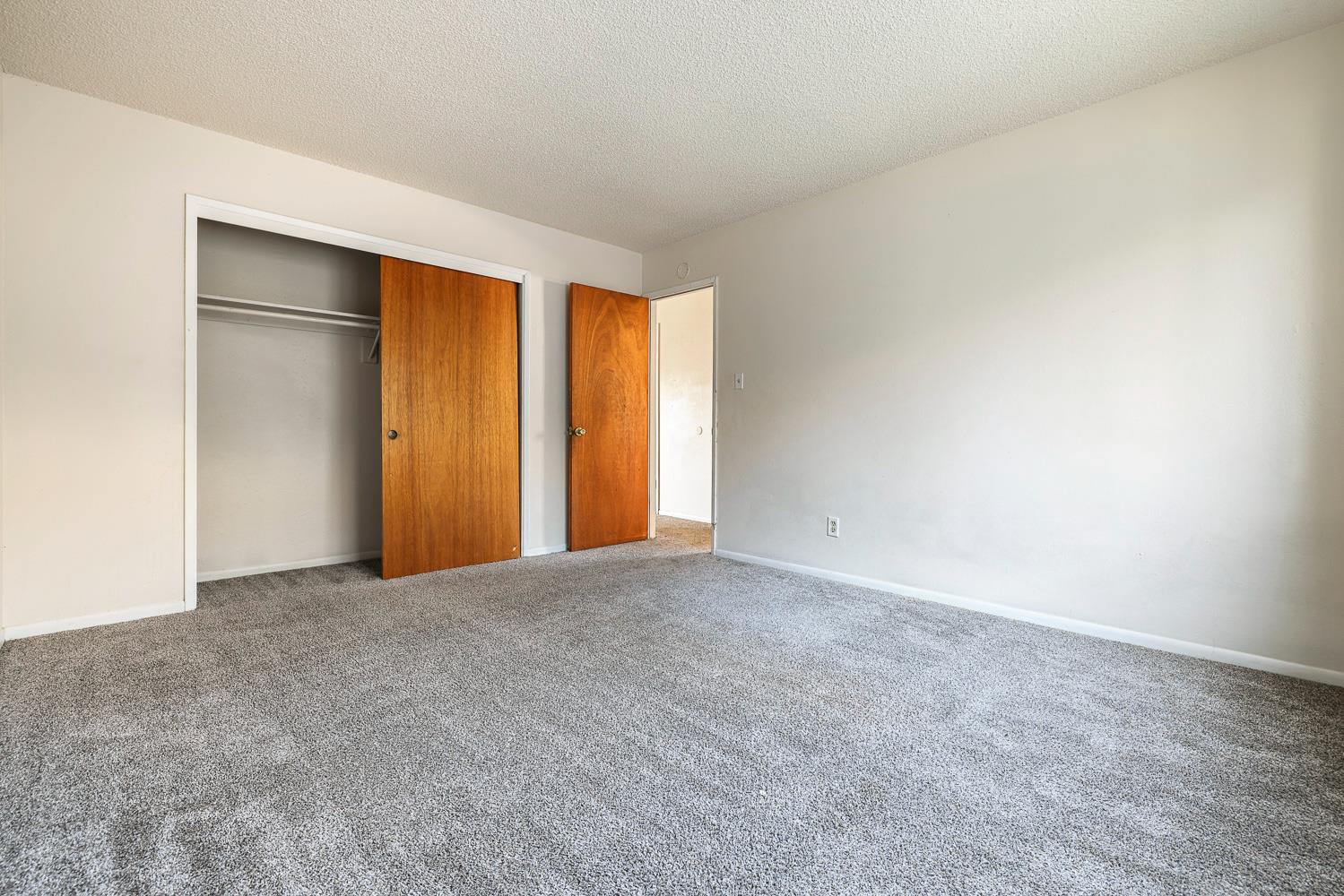 180 Monroe Street Coalinga, CA 93210 - Photo 18 of 25 a view of an empty room and window