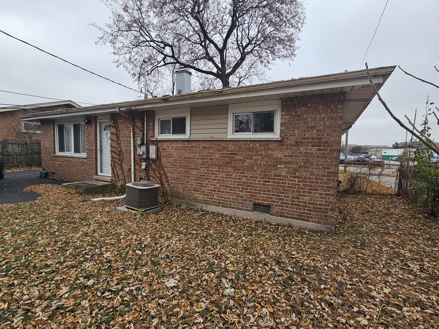 3114 West 163rd Street Markham, IL 60428 - Photo 14 of 16 a backyard of a house with lots of green space
