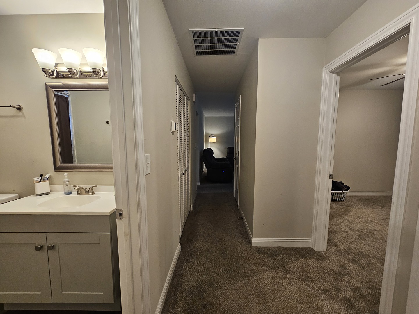 3114 West 163rd Street Markham, IL 60428 - Photo 8 of 16 a view of a bathroom from the hallway