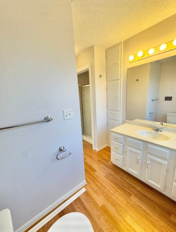 233 Farm To Market 696 Elgin, TX 78621 - Photo 17 of 28 a bathroom with a granite countertop sink a mirror and a