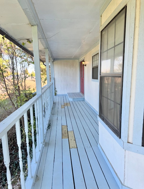 233 Farm To Market 696 Elgin, TX 78621 - Photo 23 of 28 a view of wooden balcony