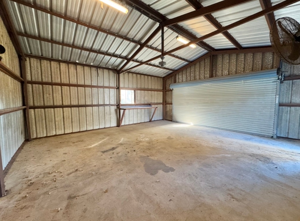 233 Farm To Market 696 Elgin, TX 78621 - Photo 25 of 28 a view of an empty room with a window