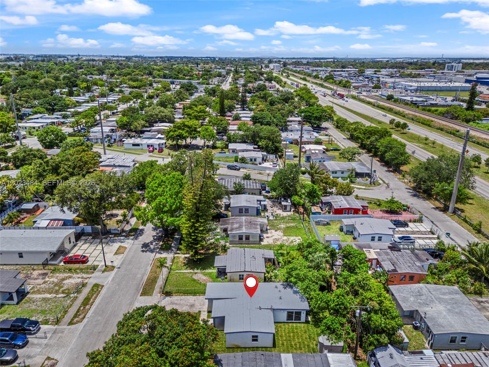 1961 Rutland Street Opa-Locka, FL 33054 - Photo 31 of 33 an aerial view of residential houses with outdoor space