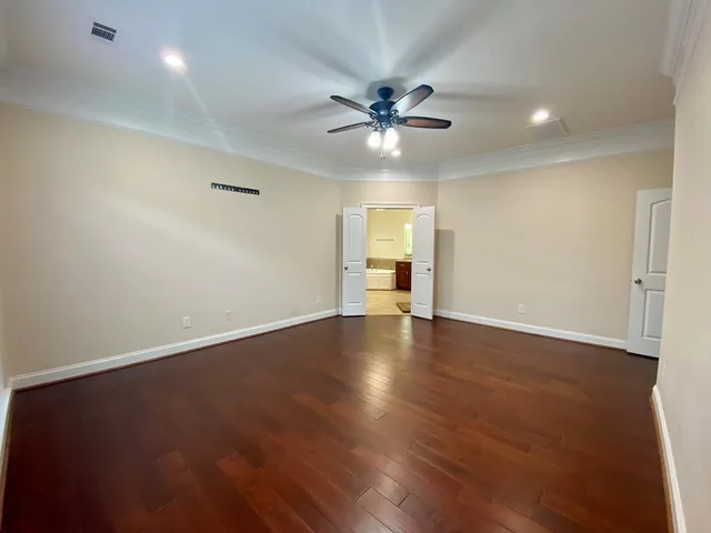 a backyard of a house with lots of green space