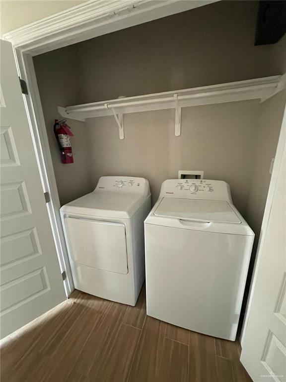 509 Sparrow Road, Unit 3 Weslaco, TX 78596 - Photo 11 of 19 a utility room with dryer and washer