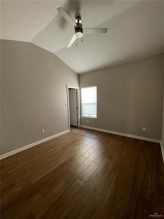509 Sparrow Road, Unit 3 Weslaco, TX 78596 - Photo 13 of 19 an empty room with wooden floor fan and windows