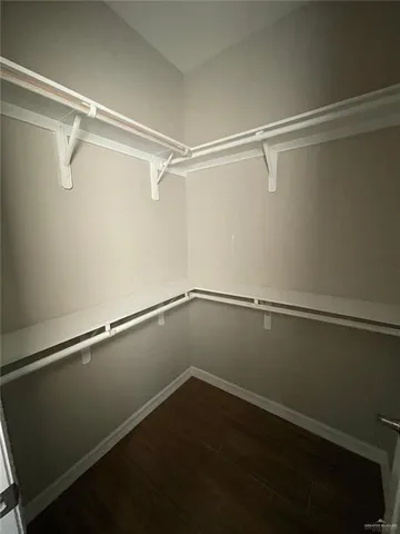 a view of a room with racks on the wall