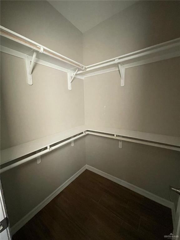 509 Sparrow Road, Unit 3 Weslaco, TX 78596 - Photo 14 of 19 a view of a room with racks on the wall