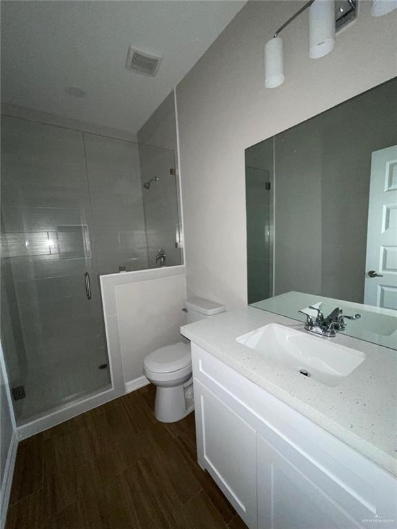 509 Sparrow Road, Unit 3 Weslaco, TX 78596 - Photo 17 of 19 a bathroom with a sink and a mirror