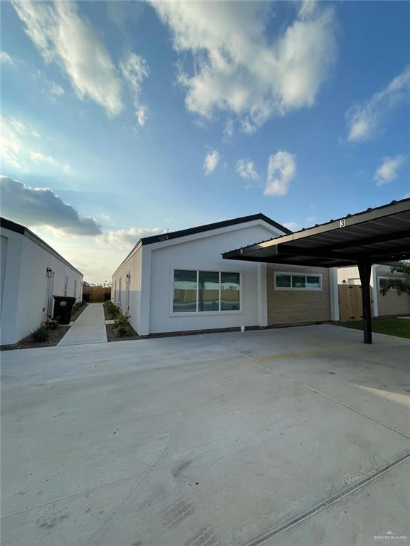 509 Sparrow Road, Unit 3 Weslaco, TX 78596 - Photo 2 of 19 a view of a house with a garage