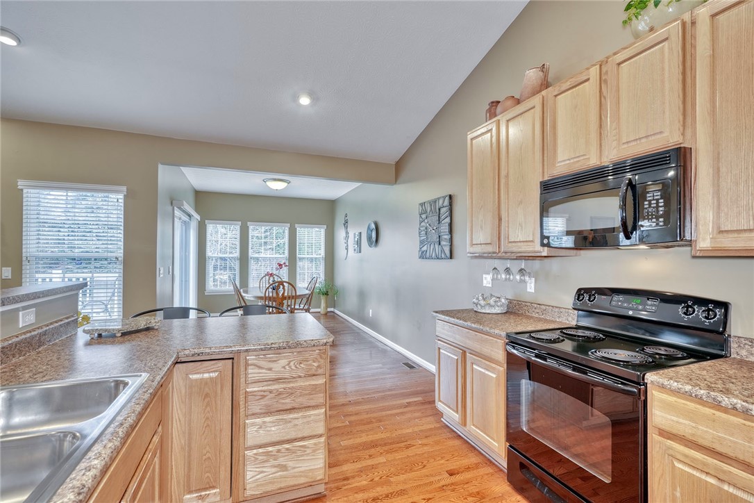 1082 Railway Crossing Webster, NY 14580 - Photo 12 of 43 KITCHEN VIEW TO DINING AREA